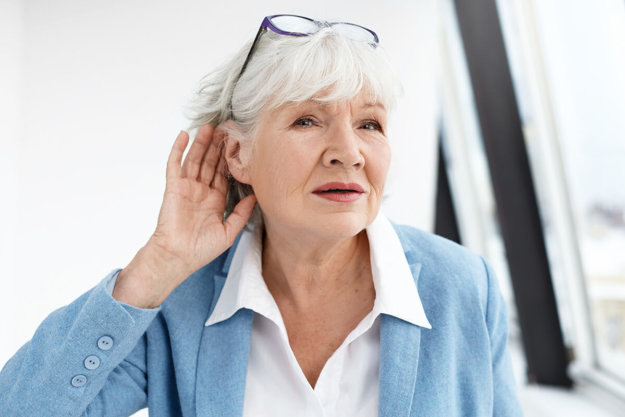 All About Hearing Loss in Seniors (1) woman experiencing hearing loss