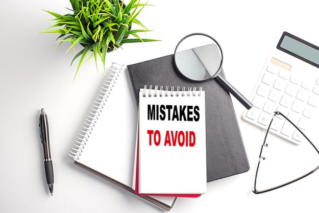 Text MISTAKES TO AVOID on notebook with office tools on white background Looking For Personal Care Near Sellersville, PA: 4 Mistakes To Avoid
