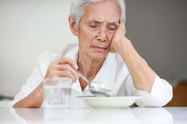Sick asian senior woman suffering from anorexia, Sick asian senior woman suffering from anorexia,