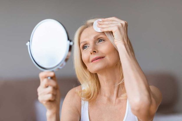 Facial-skincare.-Attractive-caucasian-mature-woman-using