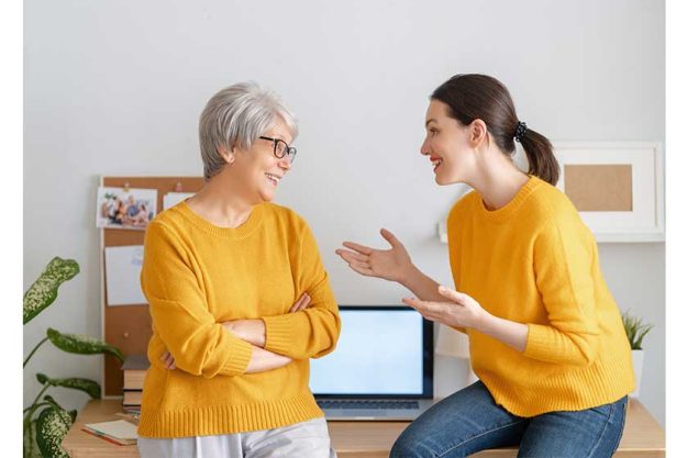 Young-and-senior-women-are-chatting-and-laughing