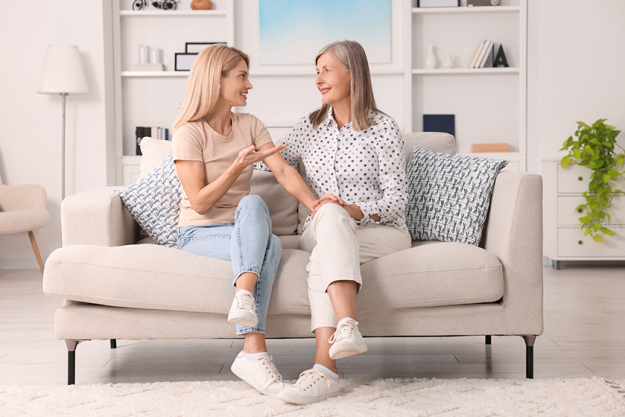 happy-mature-mother-her-daughter-talking