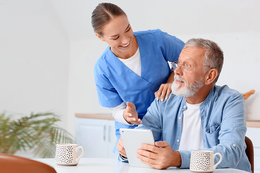 senior-man-nurse-using-tablet-computer senior-man-nurse-using-tablet-computer