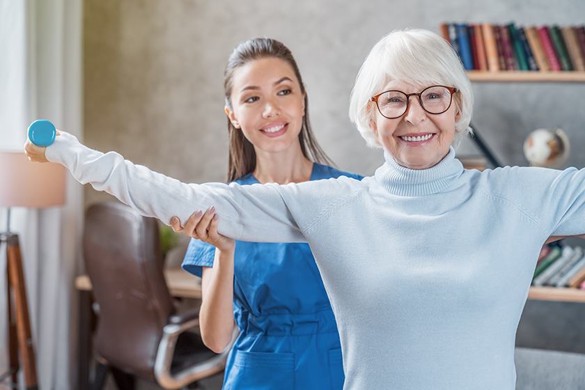 senior-woman-training-physiotherapist senior-woman-training-physiotherapist