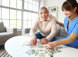senior-woman-caregiver-doing-puzzle