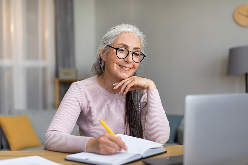 smiling-elderly-european-gray-haired-woman Smiling elderly european gray-haired woman in glasses